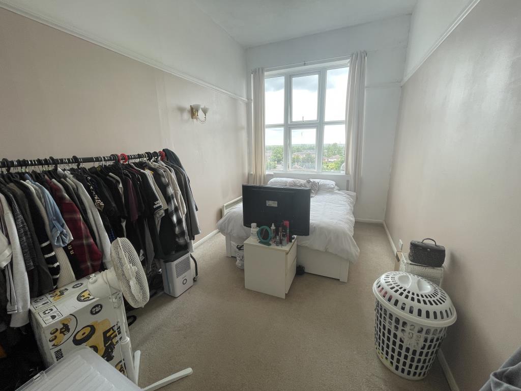 Lot: 149 - TOP FLOOR FLAT FOR INVESTMENT OR OWNER-OCCUPATION - inside image of main bedroom from hallway